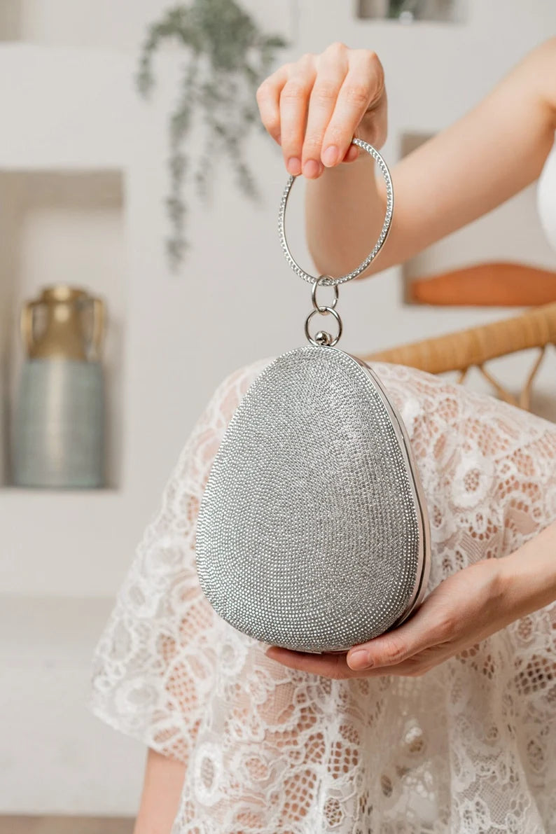 Personalized stylish bag with pear effect stones in silver color